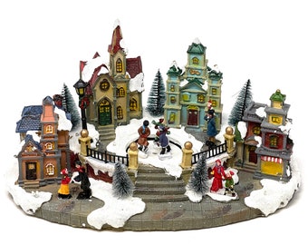 Allgala Crafted Polyresin Christmas House Collectable Figurine with USB and Battery Dual Power Source-Ice Rink in Village-XH93430