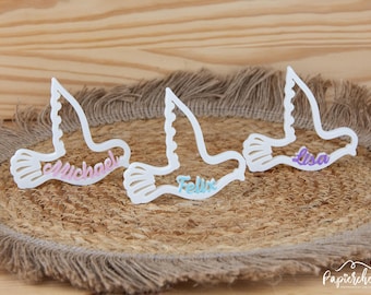 Personalized doves with name, name tags, place cards, table decorations, and scatter decorations for baptisms, communions, confirmations, and weddings.