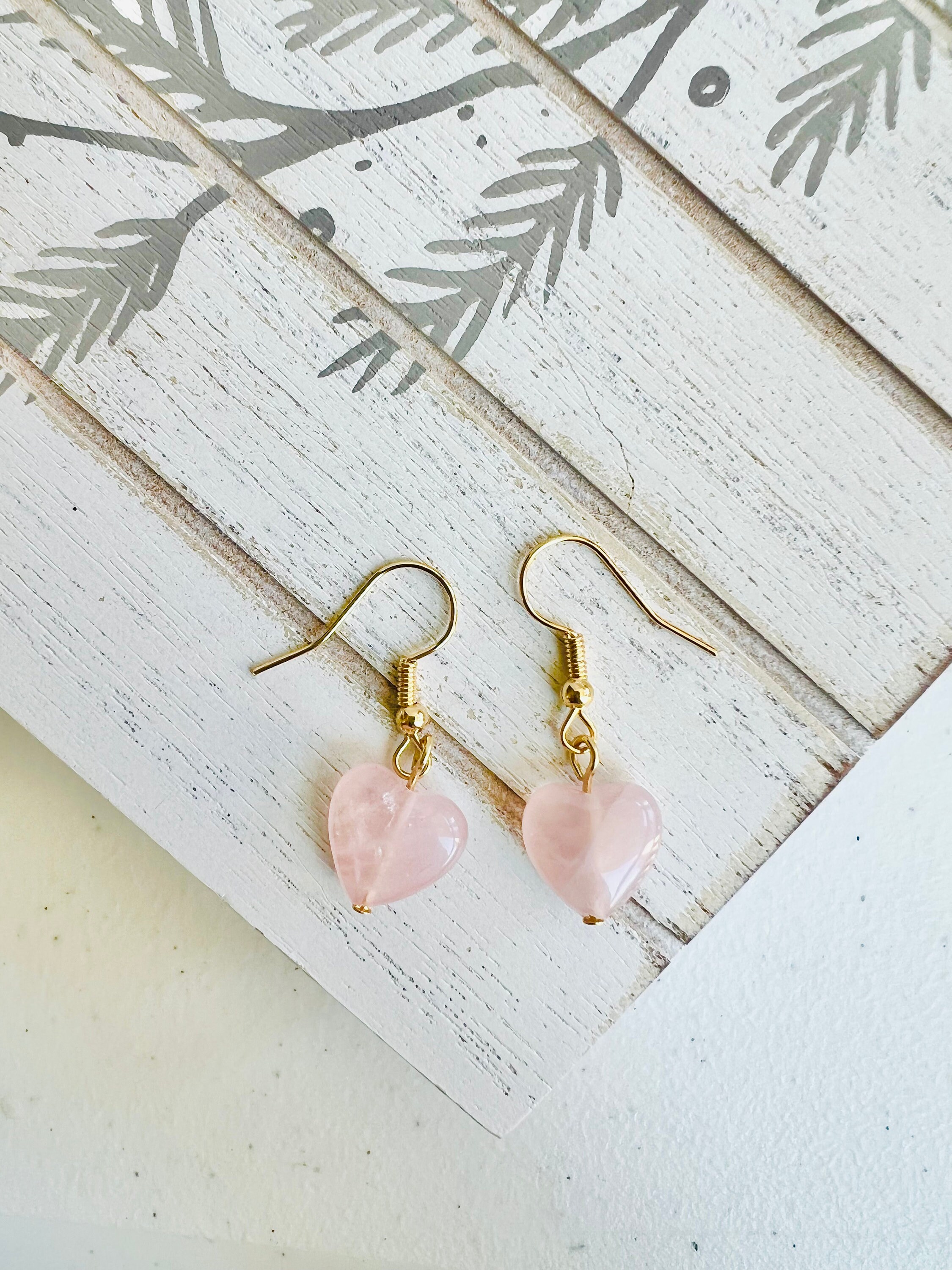 coach rose quartz earrings