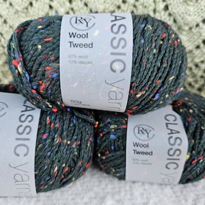 May include: Three balls of green wool yarn with red, yellow, and blue flecks. The yarn is labeled "Classic Yarn" and "Wool Tweed" with the brand "RY".