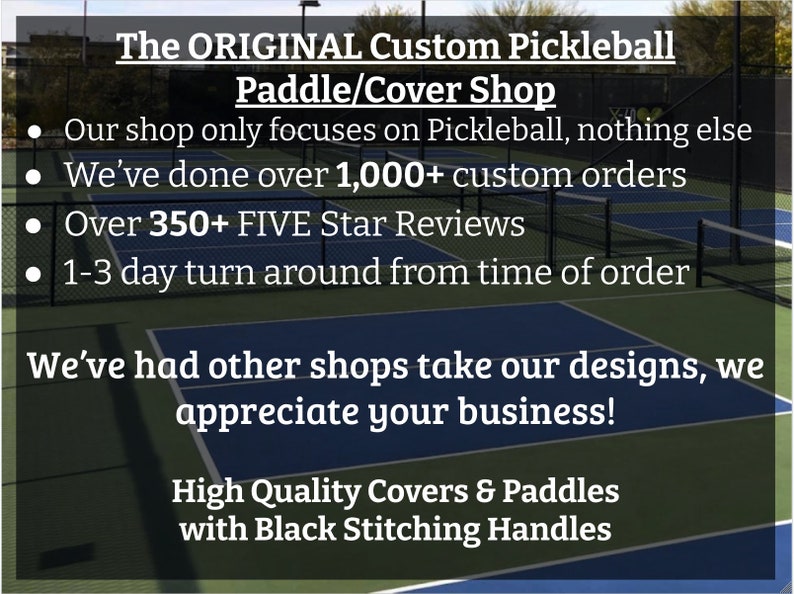 May include: A green pickleball court with a sign that reads "The ORIGINAL Custom Pickleball Paddle/Cover Shop". The sign also lists the shop's services, including over 1,000 custom orders and 350+ five-star reviews.