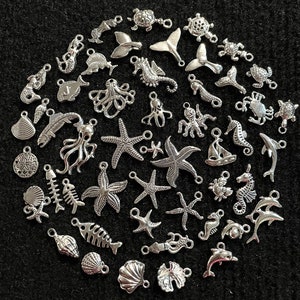 50 Piece Ultimate Ocean Charm Assortment mixed antique silver metal charms for jewelry making, scrapbooking, crafts, 1/4” to 3/4”