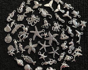50 Piece Ultimate Ocean Charm Assortment mixed antique silver metal charms for jewelry making, scrapbooking, crafts, 1/4” to 3/4”