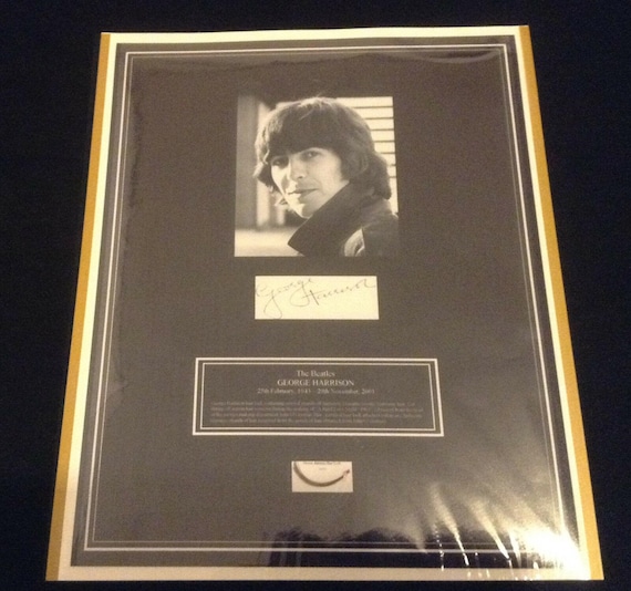 Beatles Rare George Harrison Authentic Hair Lock - Sold at a