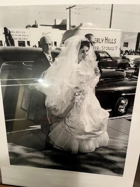 Rare limited edition 11 x 17 lithograph glossy print by world renowned photographer Frank Worth of Liz Taylor for her 1st marriage to Hilton