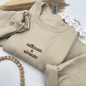 Embroidered Caffeinate And Advocate Awareness Crew Para Professional Special Ed Teacher Social Worker Gift Feminist Crewneck Equal Right