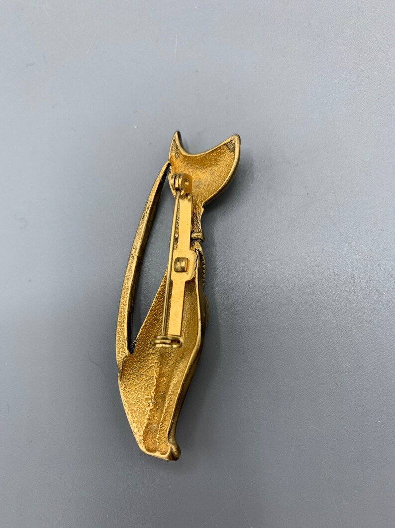 Bronze-y gold with malachite necklace. Cat brooch