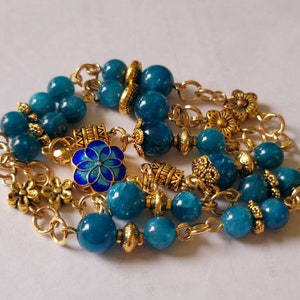 Blue Apatite Beaded Necklace, 18k filled Gold findings, flower charms, Colosseum Lotus Flower Mandala Charm