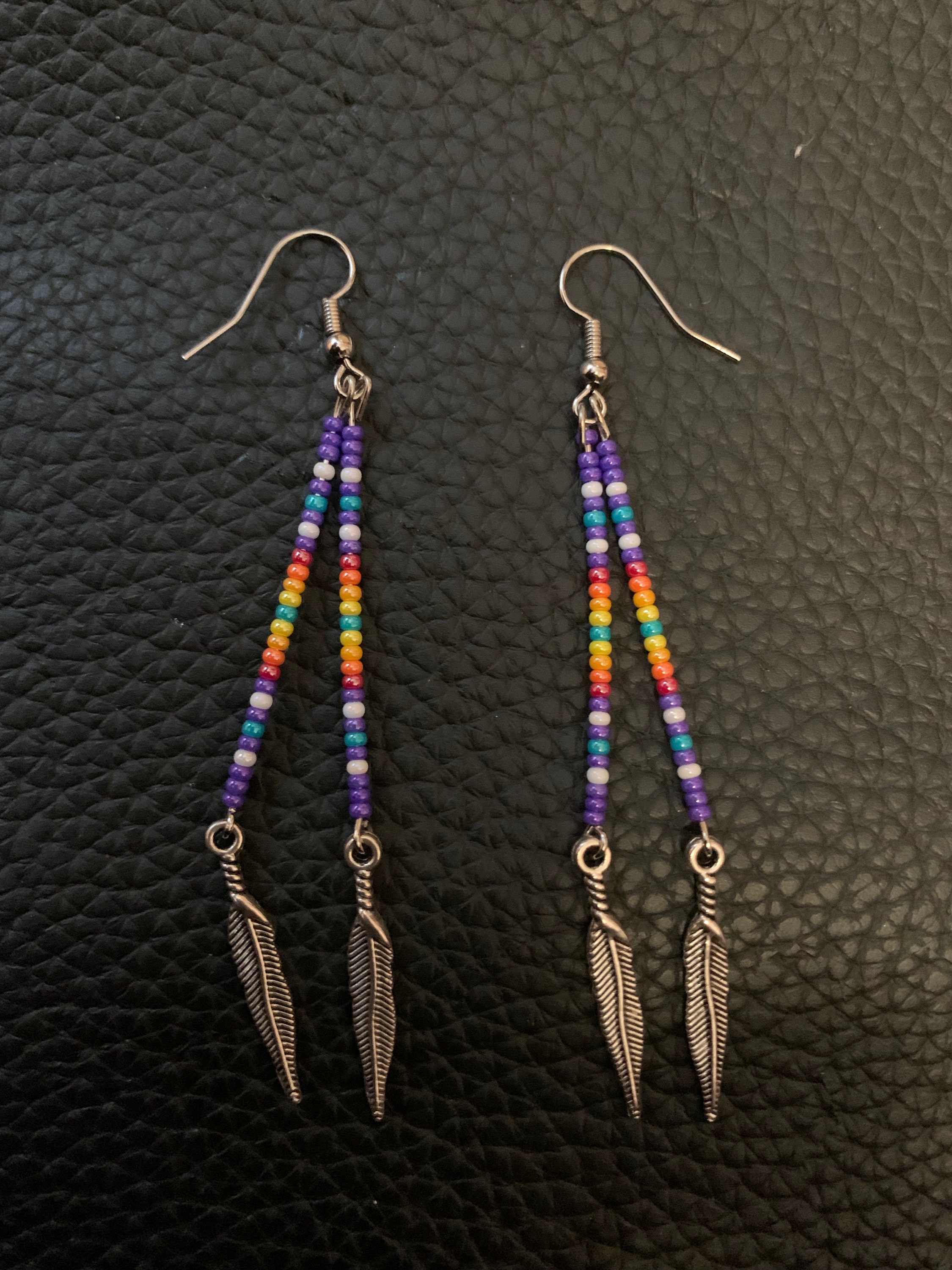 Beaded feather deals earrings