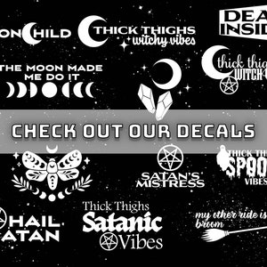 May include: A collection of black and white stickers with various designs, including a crescent moon, a pentagram, a moth, a broom, and text that reads "Thick Thighs Witchy Vibes", "Dead Inside", "The Moon Made Me Do It", "Hail Satan", "Satan's Mistress", "Thick Thighs Spooky Vibes", "My Other Ride Is A Broom", and "Thick Thighs Satanic Vibes".