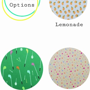 May include: Four fabric swatches with different patterns: lemons on a light blue background, golf clubs and tees on a green background, tulips and petals on a beige background, and the text "Pattern Options" in a yellow circle with a green outline.