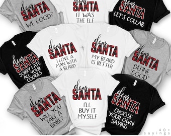May include: A collection of nine short-sleeved t-shirts in black, white, and gray. Each shirt features the text "dear SANTA" in a red and black buffalo plaid pattern, followed by various humorous holiday-themed phrases printed in black lettering.