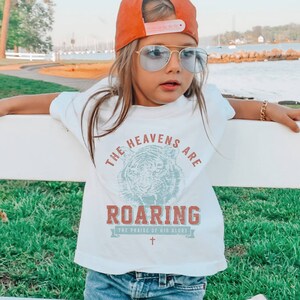 The Heavens Are Roaring Bible Verse Christian Religious Faith T-Shirt The Heavens Are Roaring Bible Verse Christian Religious Faith T-Shirt