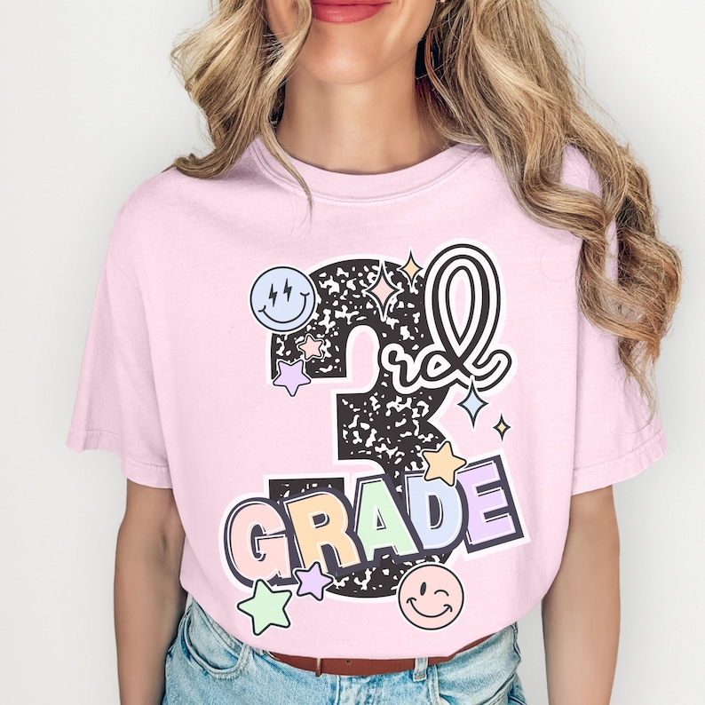 a girl wearing a pink t - shirt with the number 3 on it