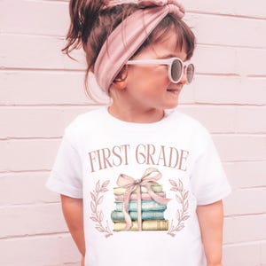 Coquette First Grade Shirt, Pink Ribbon 1st Grade Tee for Girls, Kids First Day of School TShirt, Child Back to School Book Lover T shirt
