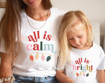 mum and daughter matching christmas jumpers