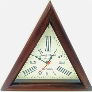 May include: Triangular wooden clock with a cream-colored face. The clock features black Roman numerals, black hands, and a red second hand. The clock face has the text "Jones & Hendricks EST 19" and "OXFORD".