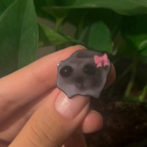 Sad Hamster Enamel Pin – Cute Animal Meme Badge, Mini Hard Enamel Pin for Jackets & Bags, Gift for Pin Collectors. Sad hamster meme.
