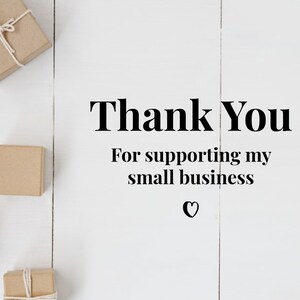 May include: Thank You for supporting my small business. A white wooden surface with five brown cardboard boxes tied with twine.