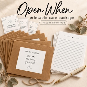 May include: A set of brown kraft paper envelopes with white labels featuring the text Open When you are doubting yourself and a mountain icon. Includes white cards with black text, lined stationery, and a pen for a printable care package.