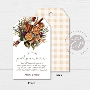 May include: A tag with a watercolor illustration of a potpourri arrangement, including cinnamon sticks and dried orange slices. The tag reads "Stovetop Potpourri" with instructions and "From: Connie". The back has a tan and white gingham pattern.