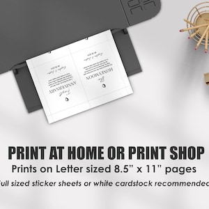 May include: A black printer outputting a white sheet of paper with two printed cards featuring black text and heart icons. The text reads First Anniversary and The Honeymoon with dates. The image includes text stating Print at home or print shop.