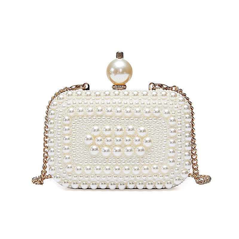 White and silver pearl hanging batua  ClutchesandMore  Clutches and More