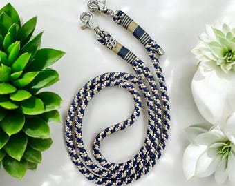 Mobile phone chain made of rope. Beige, gray, silver, mobile phone strap