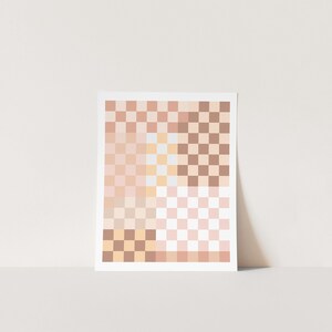 May include: A digital art print featuring a checkered pattern in shades of pink, beige, and brown. The print is divided into four sections, each with a different color scheme.