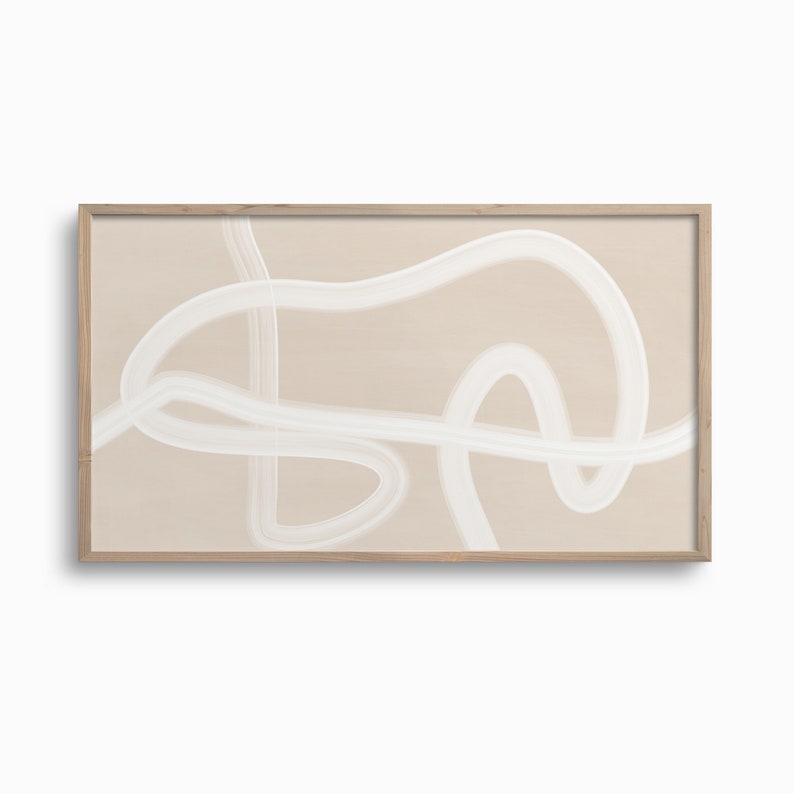 Puede incluir: Impresi&oacute;n de arte abstracto con l&iacute;neas blancas sobre un fondo beige. La impresi&oacute;n est&aacute; enmarcada en un marco de madera natural.