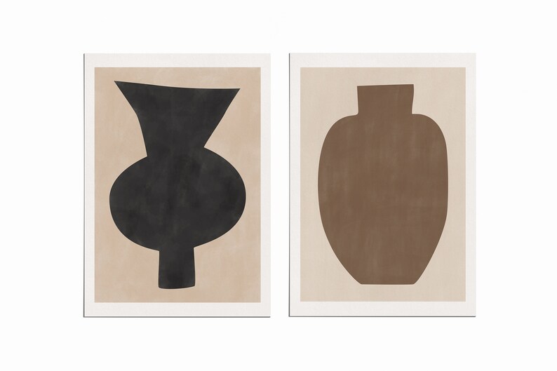 May include: Two minimalist art prints featuring abstract vase silhouettes. The left print has a black vase on a beige background. The right print has a brown vase on a beige background.