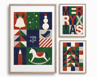 May include: Set of three framed Christmas art prints. The prints feature geometric designs with holiday motifs like a bell, snowman, and rocking horse. One print spells out "MERRY XMAS", and another says "merry & bright". The color palette includes red, green, and navy.
