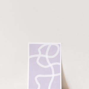 May include: A light purple abstract print with white lines forming a squiggly pattern.