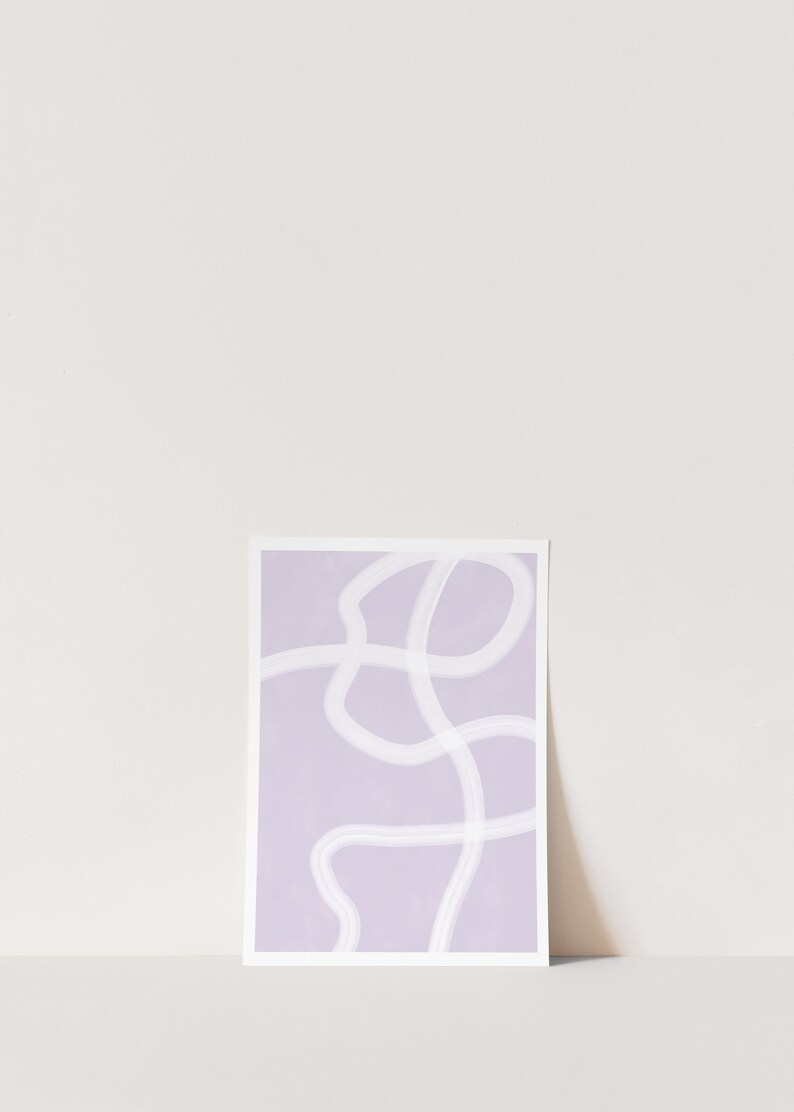 May include: A light purple abstract print with white lines forming a squiggly pattern.