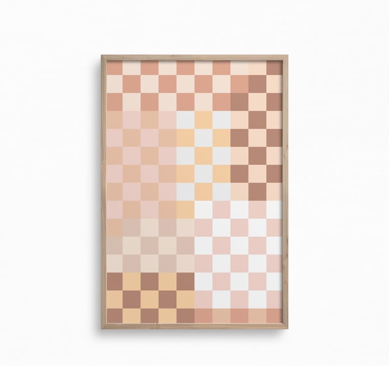 May include: A framed abstract art print with a checkered pattern in shades of brown, pink, and white.