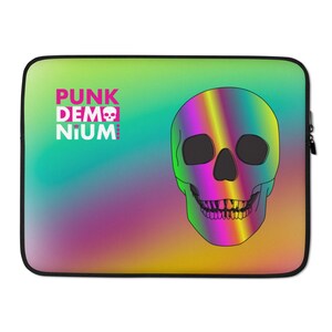 May include: Laptop sleeve with a gradient background of green, blue, yellow, and pink. The design features a colorful skull and the text "PUNK DEM NIUM" in pink and white.