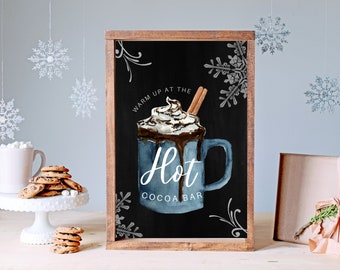 May include: A chalkboard sign with a wooden frame advertising a hot cocoa bar. The sign features a watercolor illustration of a mug of hot chocolate with whipped cream and a cinnamon stick. The text on the sign reads "Warm up at the Hot Cocoa Bar".