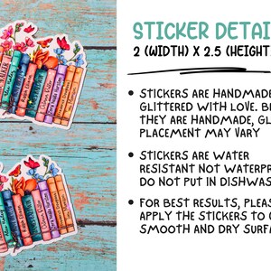 May include: Two colorful stickers featuring a stack of books with floral accents. The stickers are 2 inches wide and 2.5 inches tall. The stickers are handmade and glittered with love. The text on the stickers includes the names of authors such as Alice Walker, Langston Hughes, and James Baldwin.