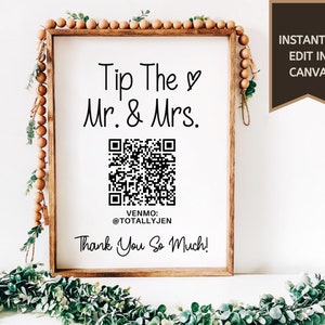 Peut inclure: Une pancarte blanche avec un cadre en bois et un code QR noir et blanc. La pancarte indique "Tip The ♥ Mr. & Mrs. VENMO: @TOTALLYJEN Thank You So Much!" et a le texte "INSTANTLY EDIT IN CANVA" dans le coin supérieur droit.