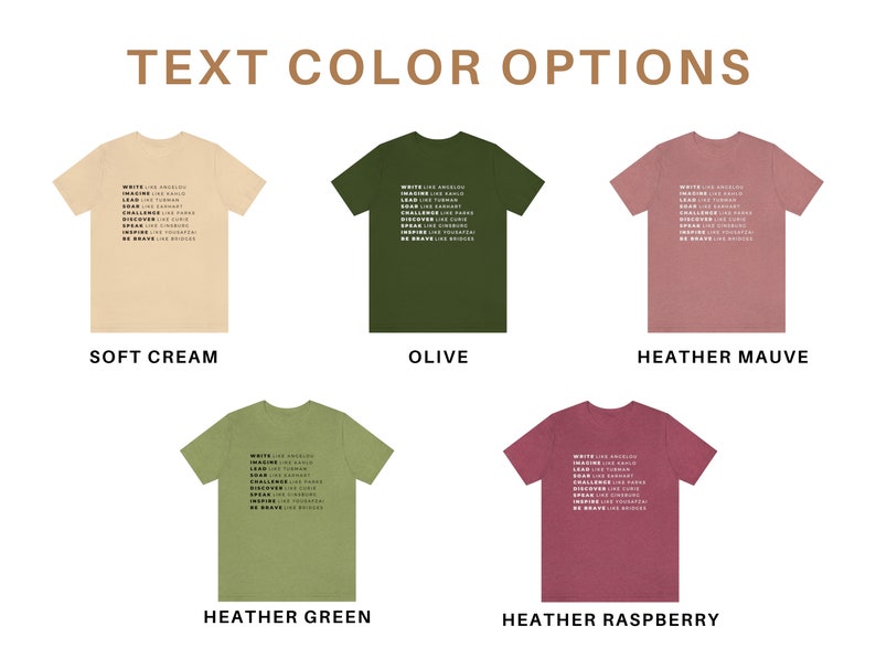 May include: Five t-shirts in different colours, including soft cream, olive, heather mauve, heather green, and heather raspberry. Each shirt features the same text printed in white: "WRITE LIKE ANGELS, IMAGINE LIKE GOD, DREAM LIKE CHILDREN, LEAD LIKE HUMAN, CHALLENGE LIKE KINGS, DISCOVER LIKE PIRATES, SPEAK LIKE YOUR HEART, INSPIRE LIKE YOUR SOUL, BE BRAVE LIKE LEGENDS".