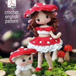 May include: Crochet pattern for a mushroom fairy doll and a smaller mushroom doll. The dolls are made with red and white yarn and have white lace trim. The pattern is available as a PDF download.