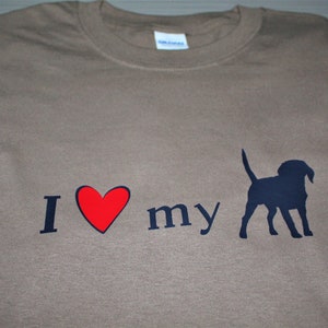 Ladies short-sleeved cotton t-shirt with &#39;I love my dog&#39;.  This tee has a red heart and a silhouette of your &#39;favorite&#39; canine breed