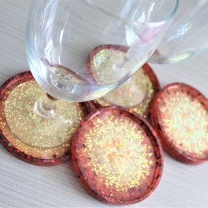Round resin beverage coasters.  Sold in 2 or 4 coaster sets.
