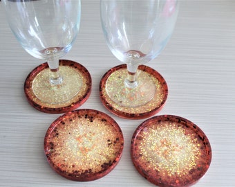 Round resin beverage coasters.  Sold in 2 or 4 coaster sets.