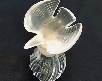perfume with doves on top