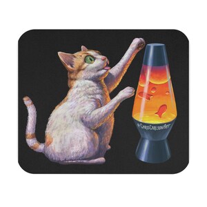 May include: A whimsical illustration features a cat reaching towards a lava lamp. The cat is white and orange with green eyes. The lava lamp is orange and red with a blue base. The text "CHRIS CARLSON ART" is on the lamp.