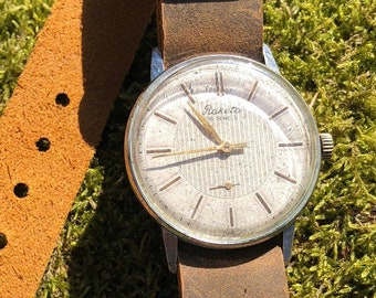 Montre habillée des années 1970 RAKETA Mécanique 16j Montre-bracelet soviétique Antichoc Vintage URSS