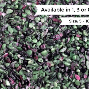 May include: A close-up view of a pile of small, polished stones. The stones are primarily green with dark black and reddish-pink inclusions. The text on the image reads "Available in 1, 3 or 8oz" and "Size: 5 - 10mm".