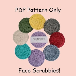 May include: A PDF pattern for crocheting face scrubbies. The image shows eight crocheted scrubbies in various colors, including green, yellow, gray, white, red, teal, purple, and blue. The scrubbies are arranged in a circle around a label that reads "Handmade Face Scrubbies Busy Bee Creations 100% Cotton".