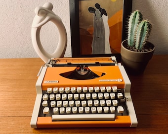 Olympia Traveller de Luxe Typewriter orange white, Midcentury 70s, fully functional, German letters, vintage mechanical portable typemachine